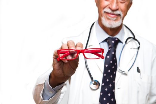 senior ophthalmologist on white background