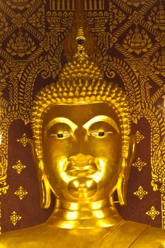 he golden Buddha statue in the church, Thailand
