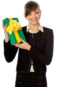 Woman holding a green box with yellow bow as a present