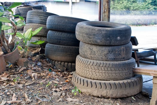 Pile of old tires. Tires used. Cars, trucks.