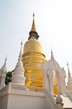 The golden pagoda is the sky background.