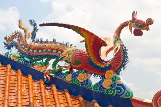 Phoenix statue on blue sky. Sian Temple. Chon Buri, Thailand.