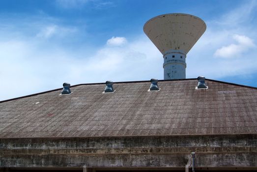 The air vent on the roof of the factory and Water Tower.