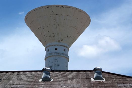 The air vent on the roof of the factory and Water Tower.