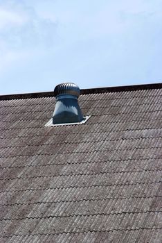 The air vent on the roof of the factory.