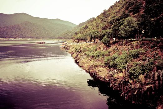 Large electric power dam in valley of western Thailand