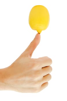 man's hand holding a lemon isolated on a white background