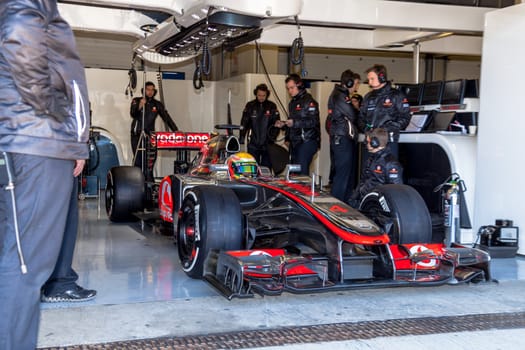 JEREZ DE LA FRONTERA, SPAIN - FEB 10: Lewis Hamilton of McLaren F1 waiting on the pit on training session on February 10 , 2012, in Jerez de la Frontera , Spain