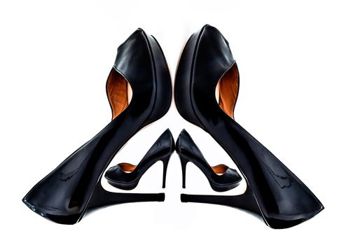 Pair of black dress women shoes isolated over white