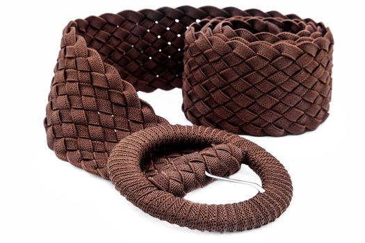 A women belts of cloth on a white background