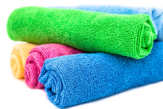 Colorful towels on a white background
