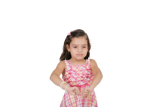 portrait of a beautiful little girl with thumb down isolated on white background