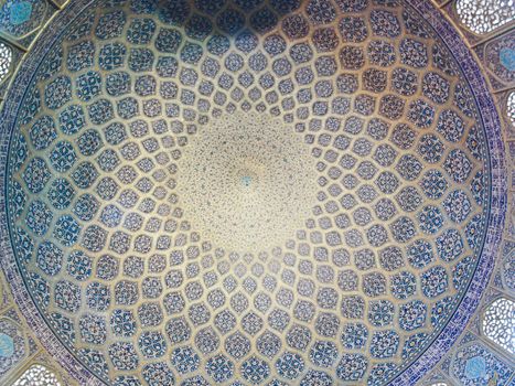 Dome of the mosque, oriental ornaments from Sheikh Loft Allah Mosque in Isfahan, Iran