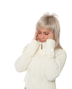 Headache of a woman in a white sweater.