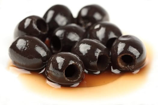 Black olives on white background