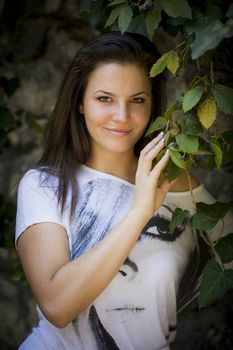 Young woman in the forest on a sunny day