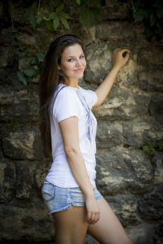 Young woman in the forest on a sunny day