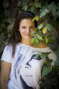 Young woman in the forest on a sunny day