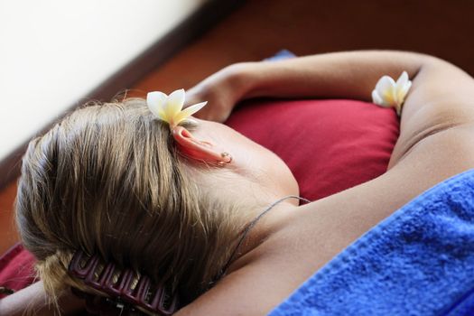 White woman on massage in Bali salon