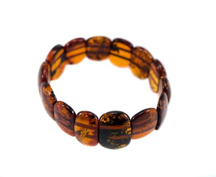 Amber stone bracelet isolated on white background. National lithuanian stone.