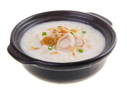 Porridge, abalone & chicken Porridge (congee) served in claypot