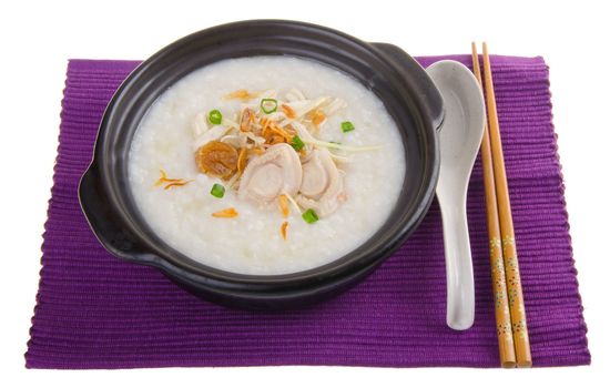 Porridge, abalone & chicken Porridge (congee) served in claypot