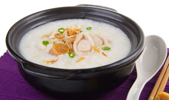 Porridge, abalone & chicken Porridge (congee) served in claypot