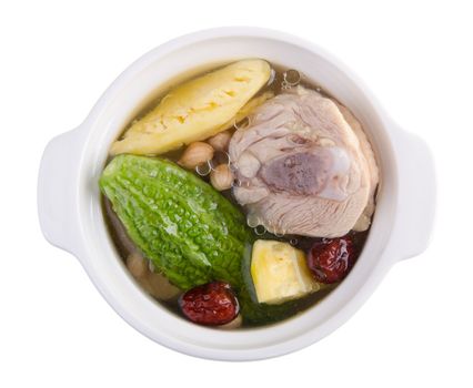 Chicken and herb soup in pot, Chinese food style.