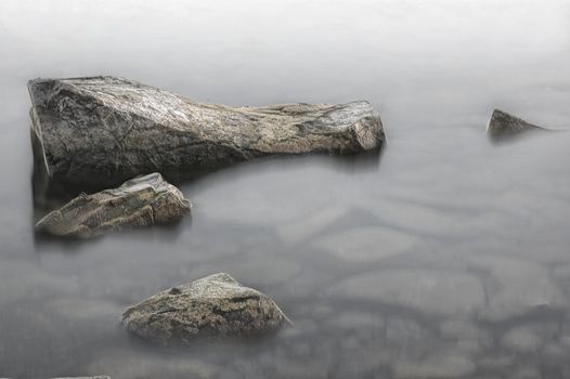 Stones near the shore in the early morning