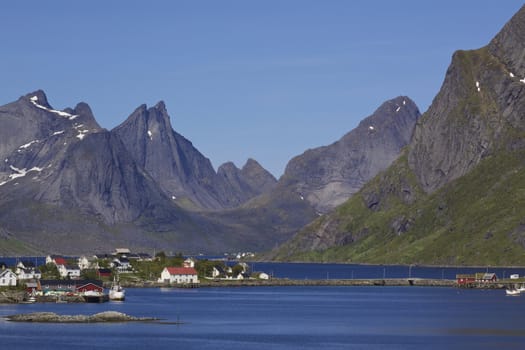 Picturesque fishing town of Reine by the fjord on Lofoten islands in Norway