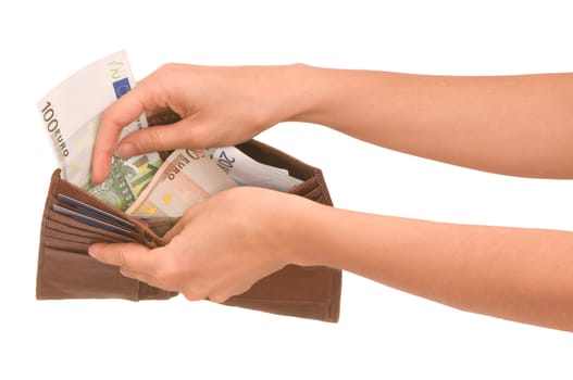 Woman taking money from the wallet for paying