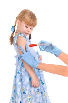 doctor making a vaccination for a child on white background