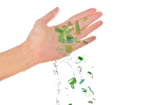 pieces of green glass in the woman's hand