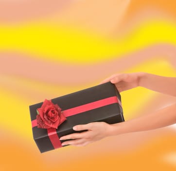 woman giving a black box with red rose as a gift