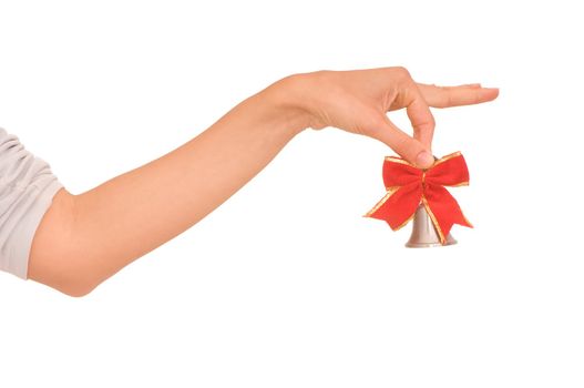 hand bell with red bow in the woman's hand for ringing