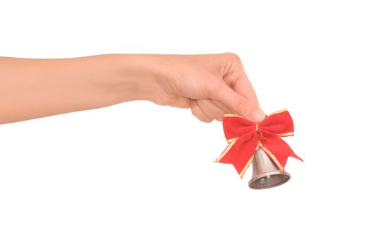 hand bell with red bow in the woman's hand for ringing