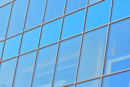 Skyscraper with mirror windows in the downtown