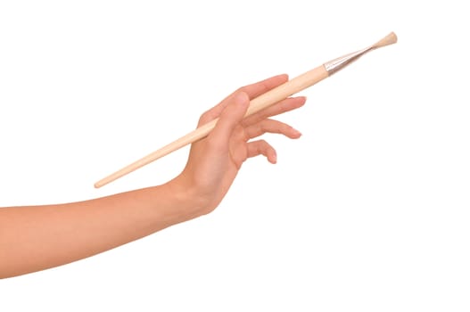 woman drawing a picture with a brush
