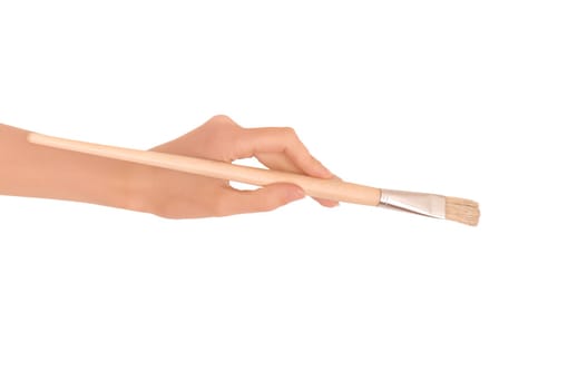 woman drawing a picture with a brush