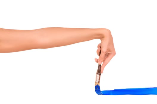 woman drawing the blue line with brush