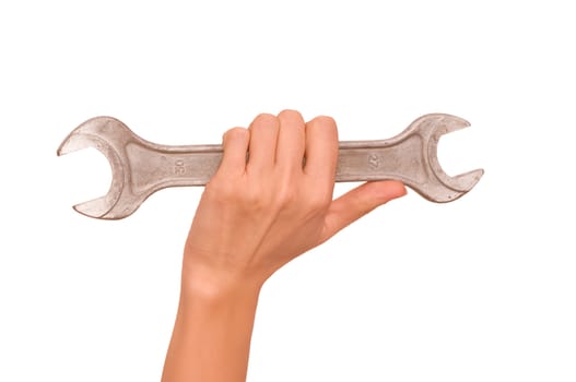 woman holding big chrome vanadium spanner in the hand