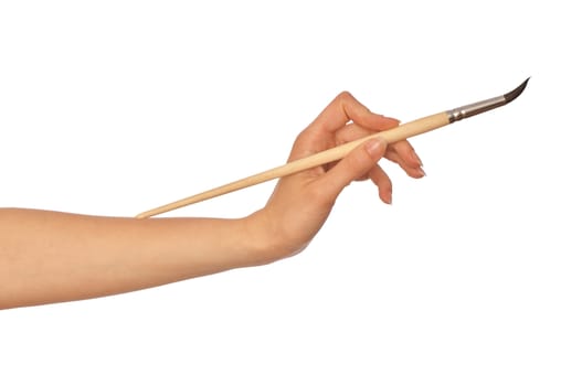 woman drawing a picture with a brush