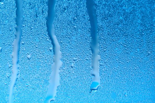 Water raindrops on the window after rain for background