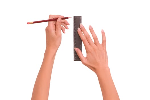 Woman draws line with rule and pencil