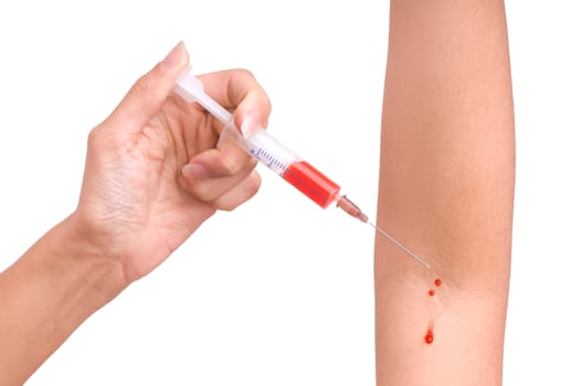 Patient make an injection for himself on white background