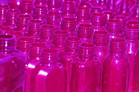 lilac empty bottles as a containers for shampoo for background