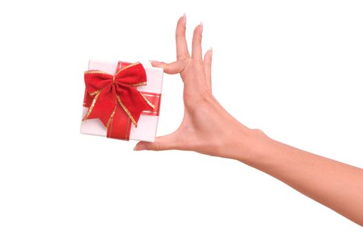 White box with red bow as a gift on white background