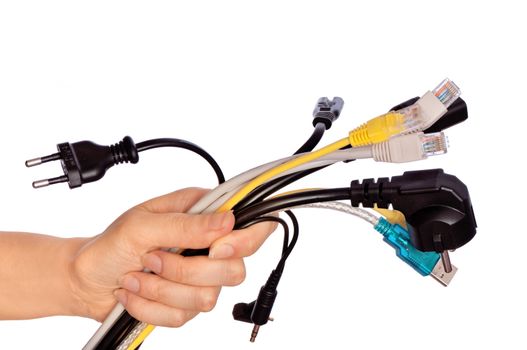 woman taking different cables in the hand on white background