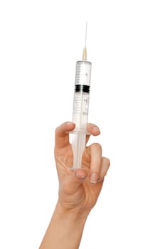 syringe in the woman's hand for making injections