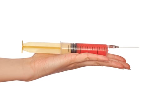 syringe in the woman's hand for making injections